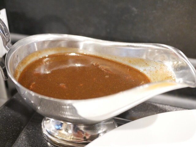 recommendations image for 旨さと辛さがここちよい黒カレー 萬栄カレー