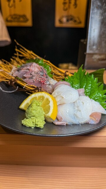 元祖ぶっち切り寿司 魚心 心斎橋店的實拍高清圖