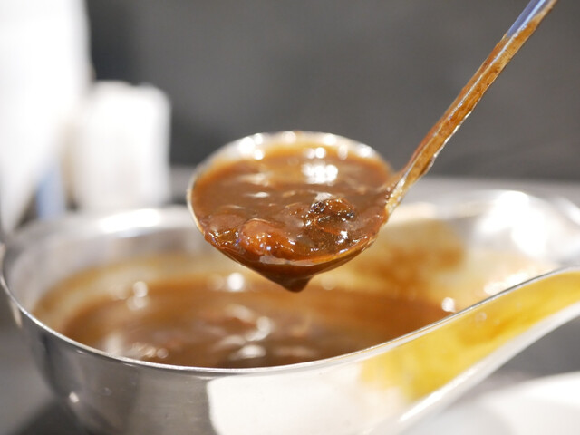 recommendations image for 旨さと辛さがここちよい黒カレー 萬栄カレー